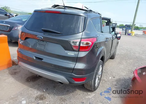 2017 Ford Escape Titanium z USA, uszkodzony, nr VIN 1FMCU0JD3HUA57747